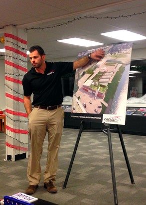 Trevor presenting heliport plans at a community meeting